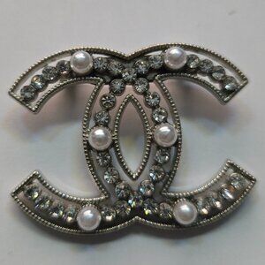 CC brooch